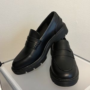 Black faux leather loafers
